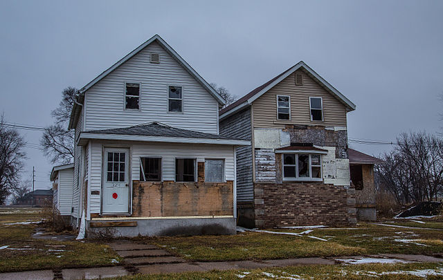 A boarded up and abandoned home in South Clinton Iowa