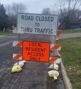 Road Construction Sign that reads ROAD CLOSED TO THRU TRAFFIC - LOCAL RESIDENTS ONLY